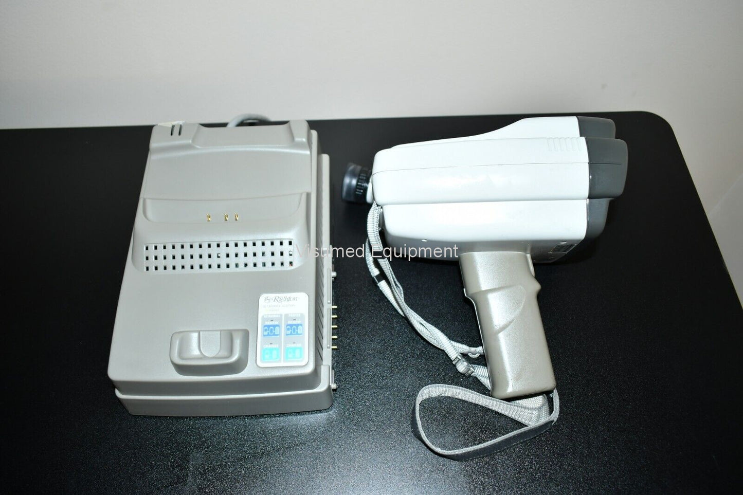 Refurbished Righton/Nikon Retinomax 2 plus K autorefractor Keratometer with charger base offered by Visumed Equipment