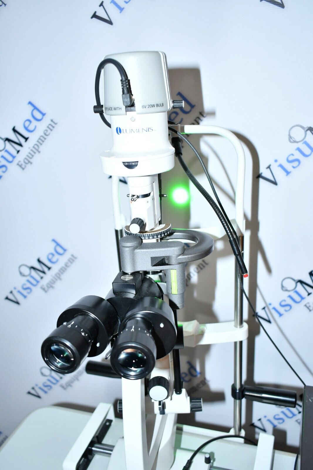 Refurbished Lumenis Novus Spectra 532nm with Lumenis slitlamp and dapter on power table offered by Visumed Equipment