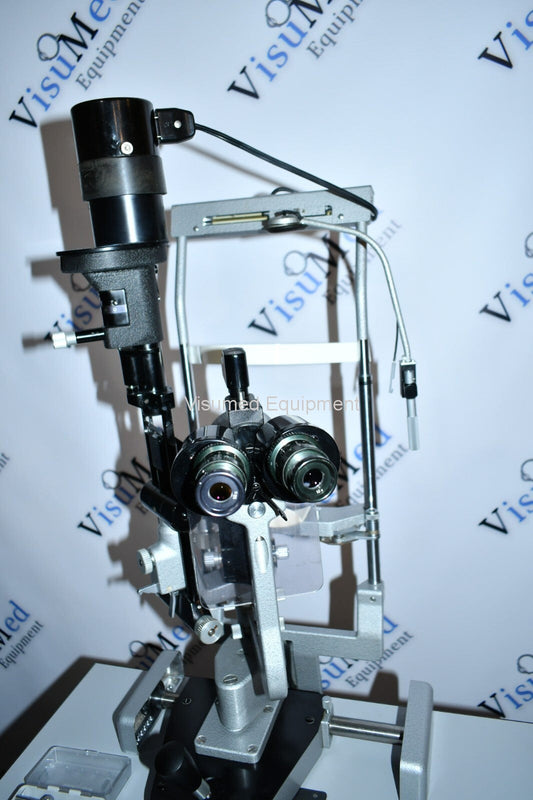 Refurbished Haag Streit BM 900 Slit lamp with GAT on manual table offered by Visumed Equipment