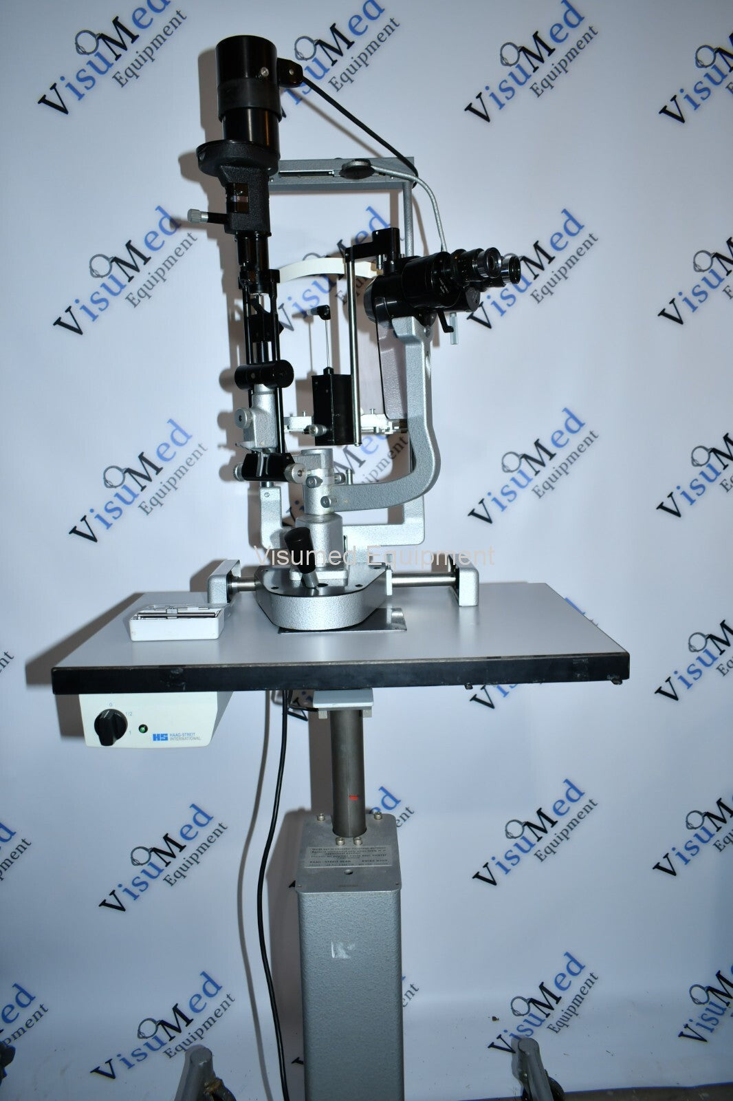 Refurbished Haag Streit BM 900 Slit lamp with GAT on manual table offered by Visumed Equipment