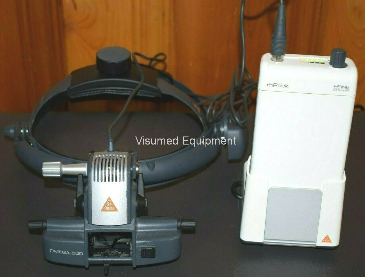 Refurbished Heine Omega 500 Binocular Indirect Ophthalmoscope with rechargeable mPack offered by Visumed Equipment