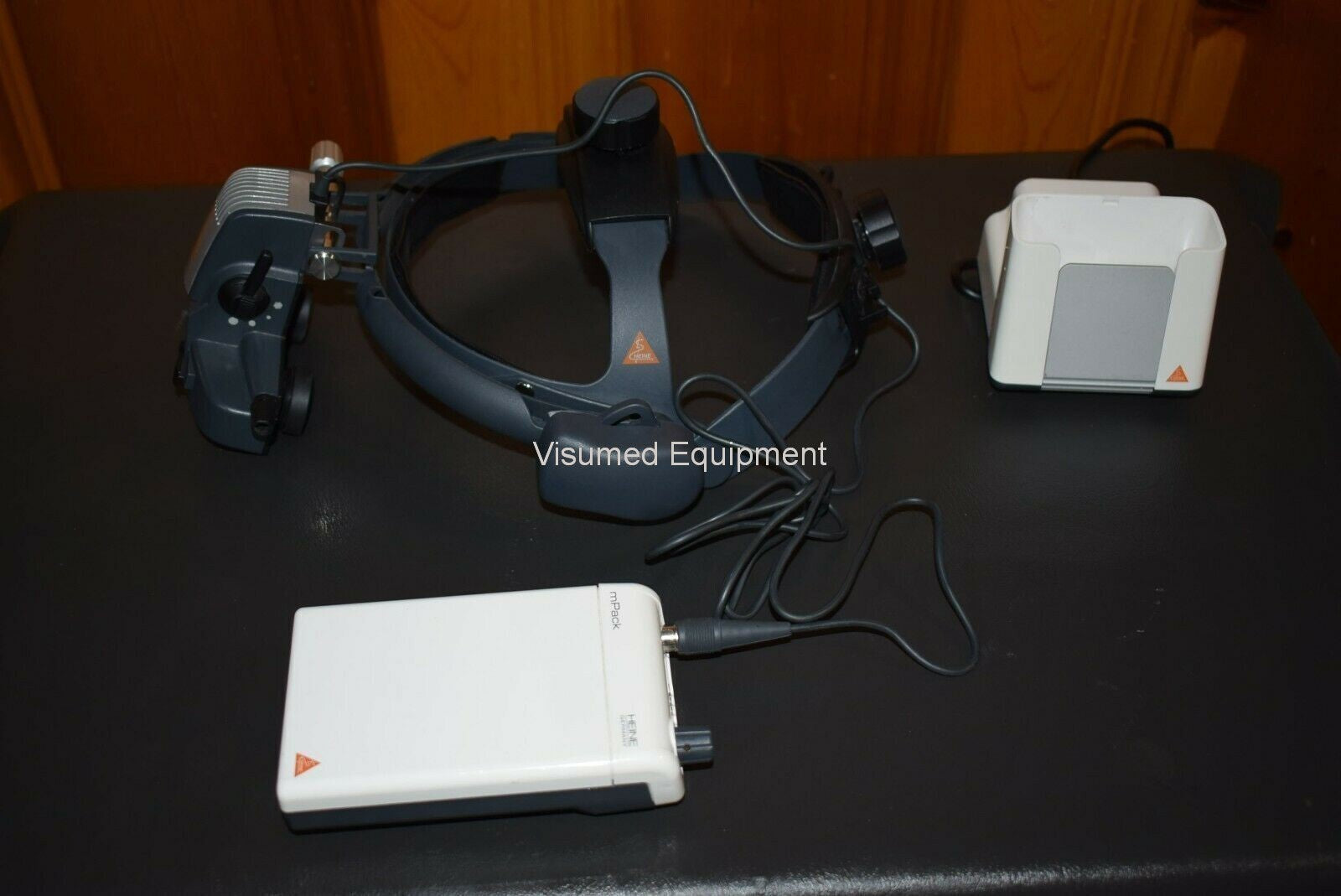 Refurbished Heine Omega 500 Binocular Indirect Ophthalmoscope with rechargeable mPack offered by Visumed Equipment