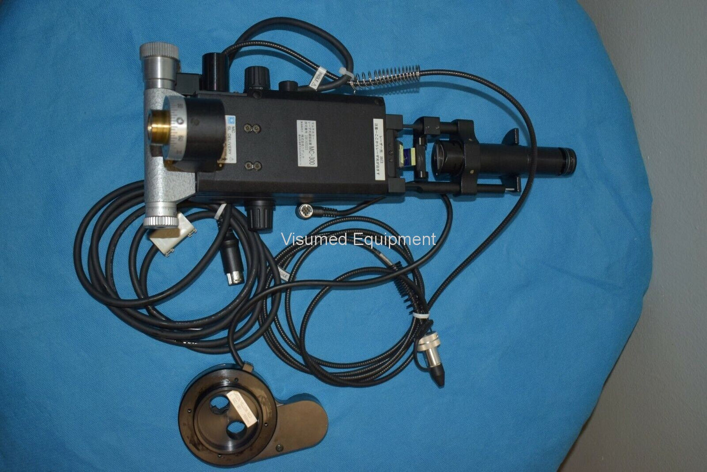 Refurbished Nidek laser adapter and filter for Haag Bq 900 offered by Visumed Equipment