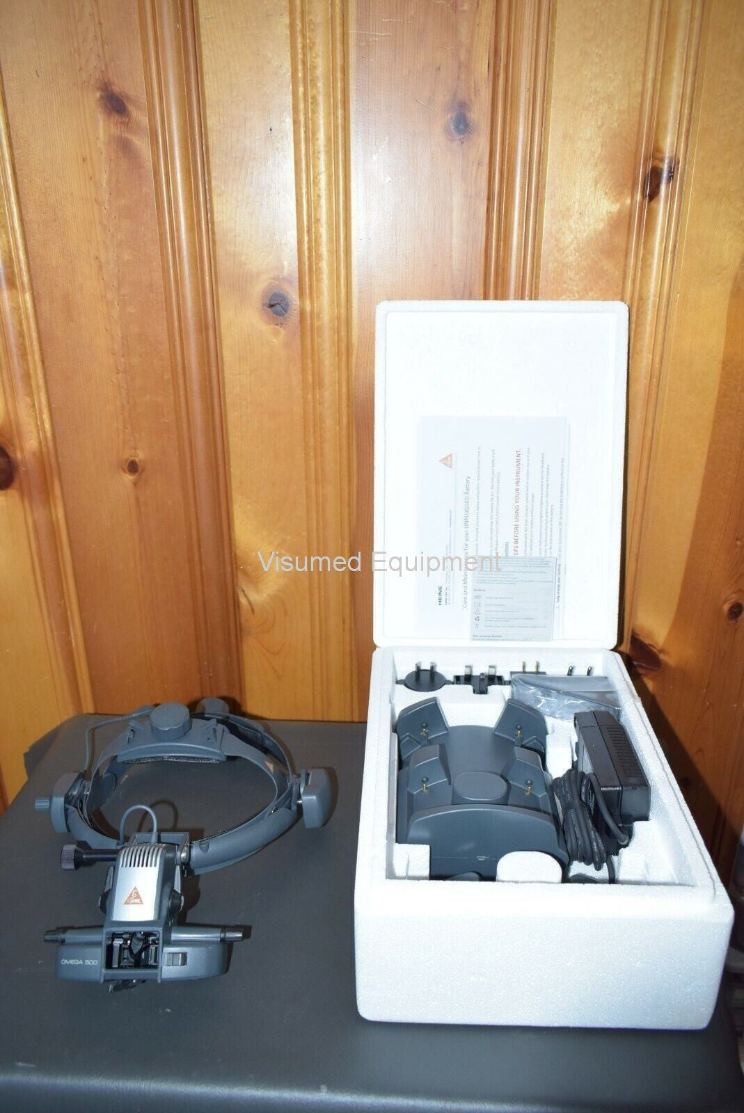 Refurbished Heine Omega 500 Unplugged Indirect Ophthalmoscope & New Battery and wall charger offered by Visumed Equipment