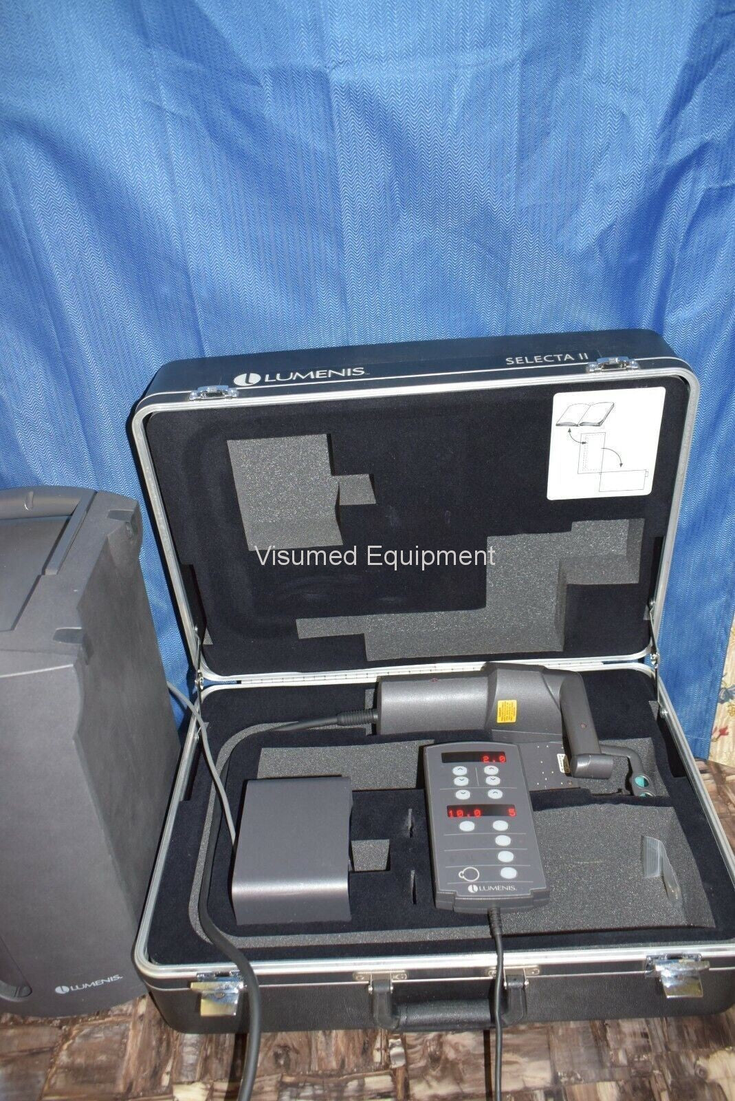 Refurbished Lumenis Selecta II SLT laser with Haag Streit Slit Lamp Attachment offered by Visumed Equipment