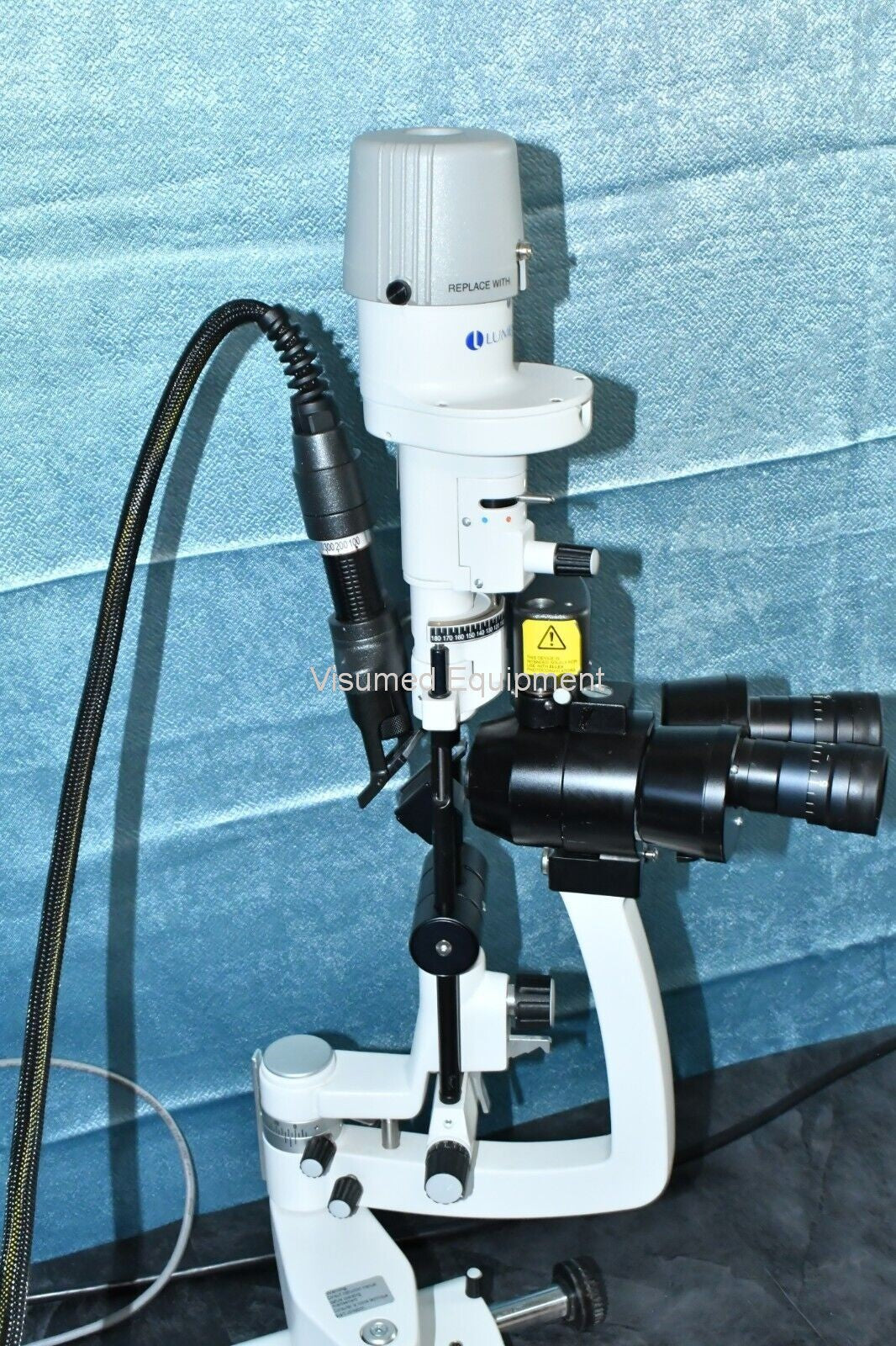 Refurbished Ellex Solitaire Green laser with Haag Streit Adapter and storage case offered by Visumed Equipment