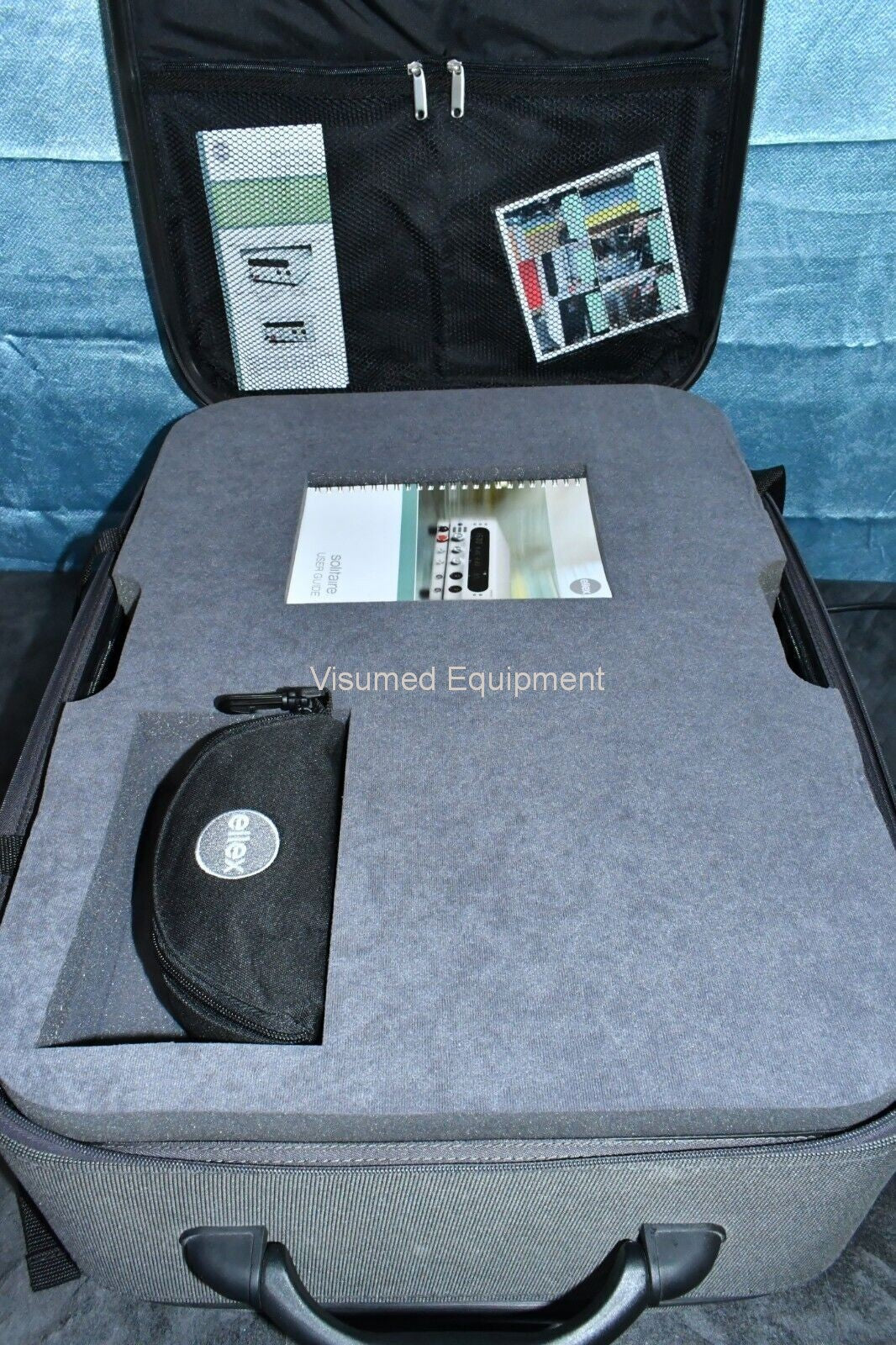 Refurbished Ellex Solitaire Green laser with Haag Streit Adapter and storage case offered by Visumed Equipment
