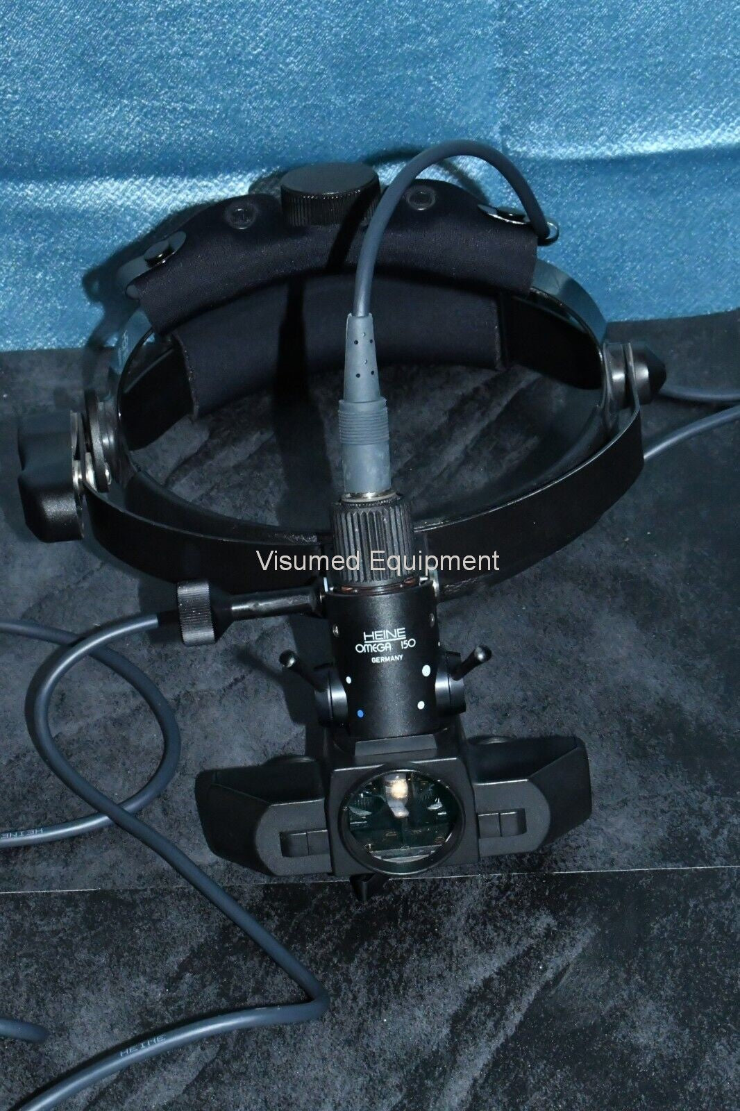 Refurbished Heine Omega 150 Wired BIO Binocular Indirect Ophthalmoscope with EN-30 power offered by Visumed Equipment