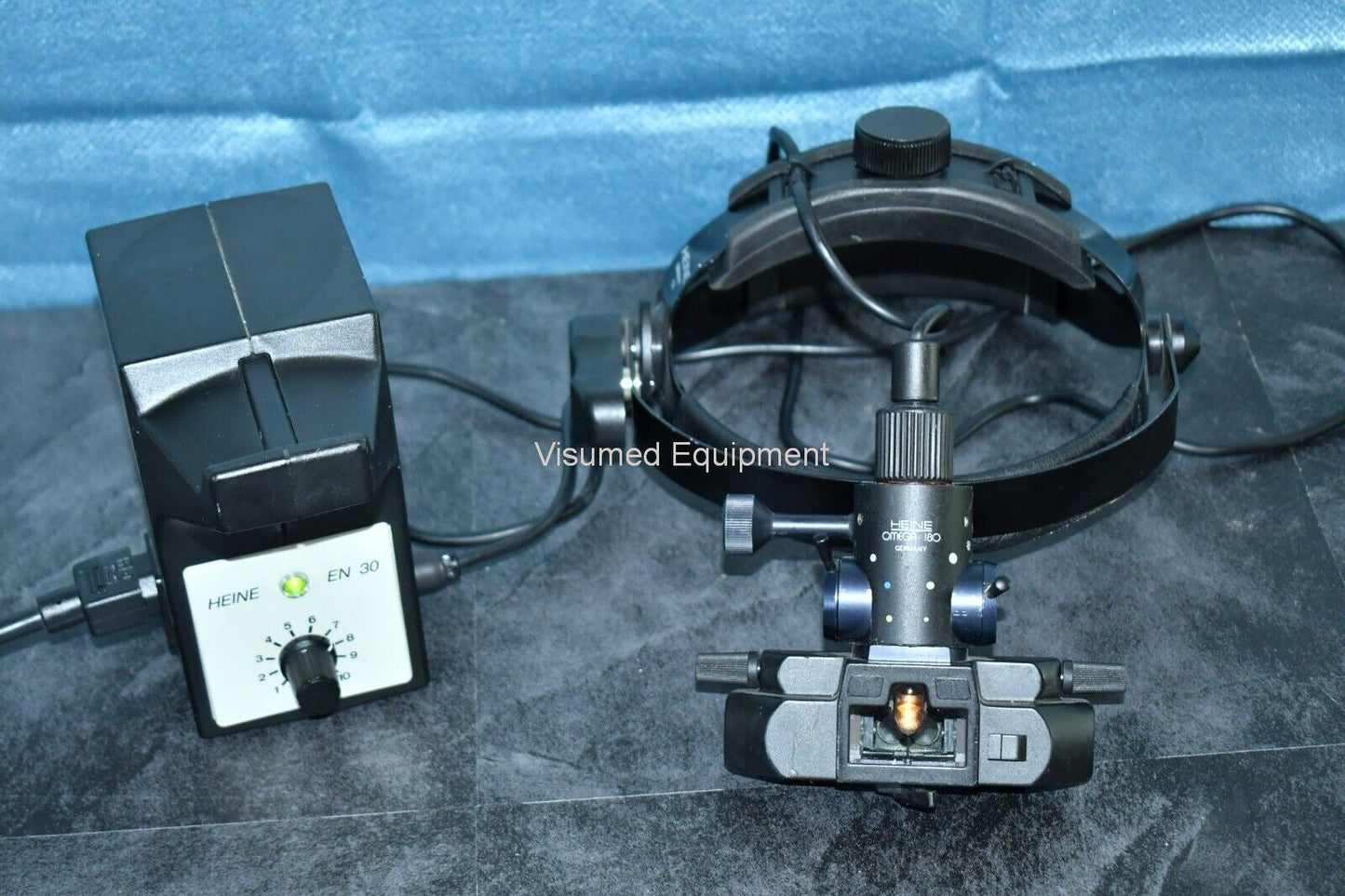 Refurbished Heine Omega 180 Wired BIO Binocular Indirect Ophthalmoscope with EN-30 power offered by Visumed Equipment