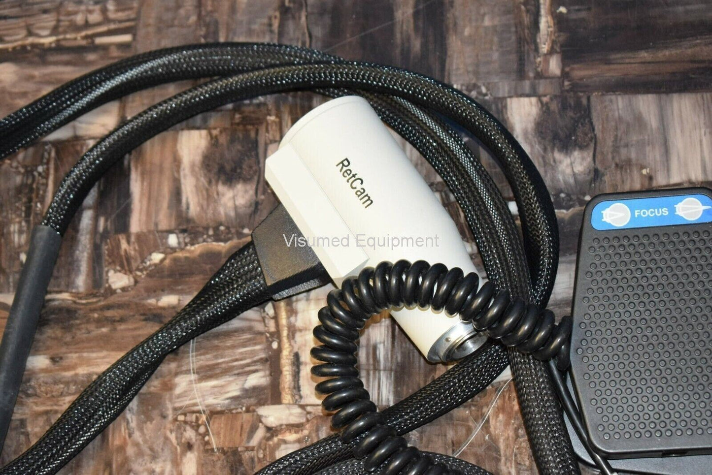 Refurbished Clarity Retcam Shuttle camera handpiece and foot pedal offered by Visumed Equipment