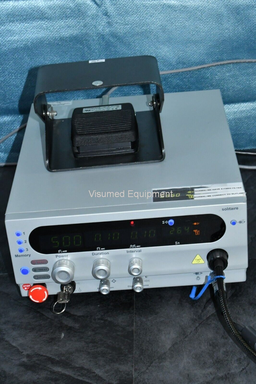 Refurbished Ellex Solitaire Green laser with Haag Streit Adapter and storage case offered by Visumed Equipment