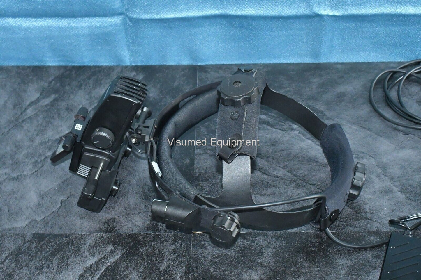 Refurbished Keeler Vantage Binocular Indirect Ophthalmoscope with outlet power supply offered by Visumed Equipment