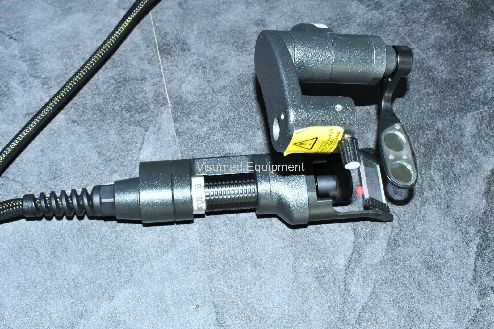 Refurbished Ellex Solitaire Green laser with Haag Streit Adapter and storage case offered by Visumed Equipment